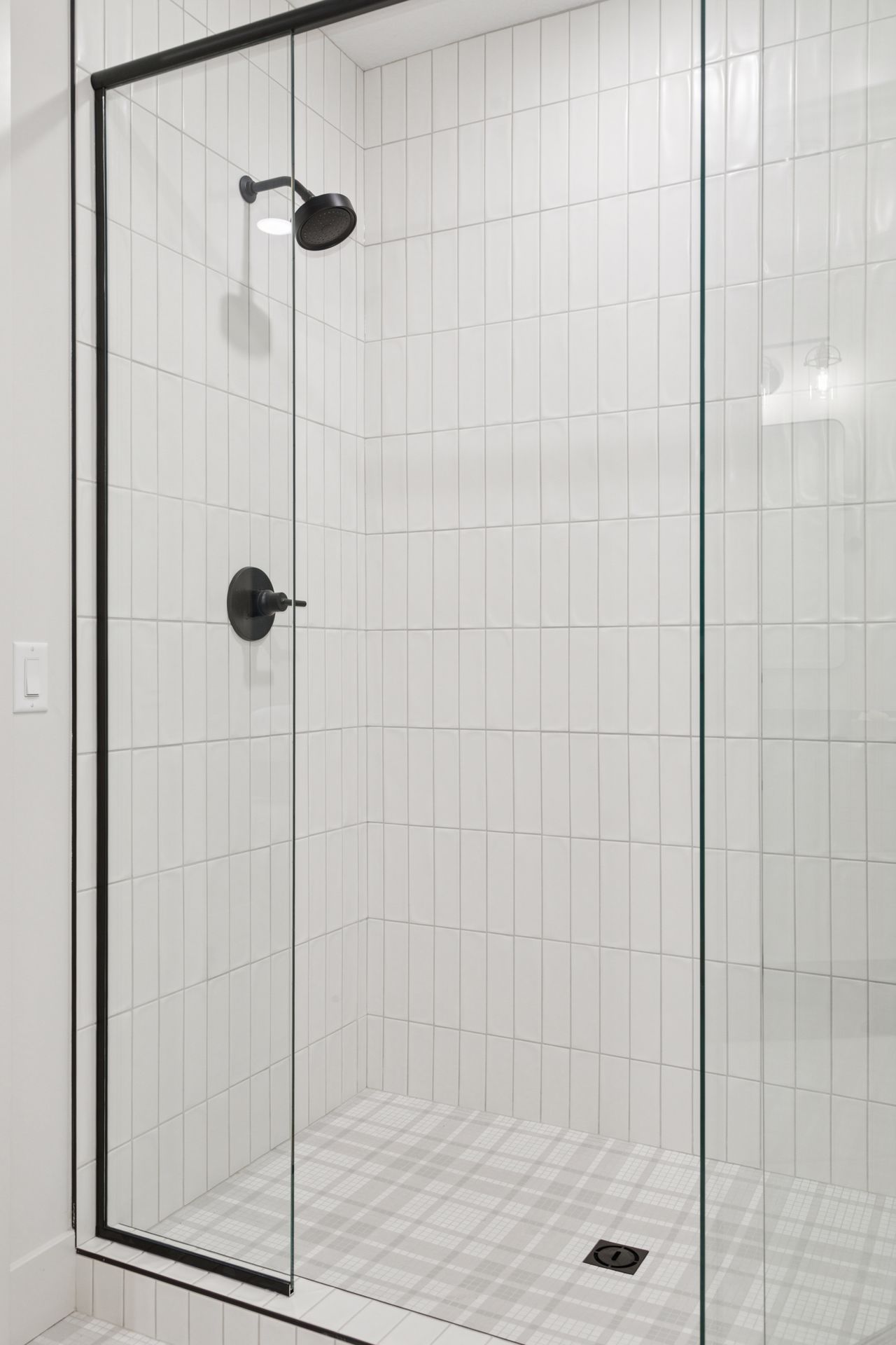 Lower level bathroom tile shower